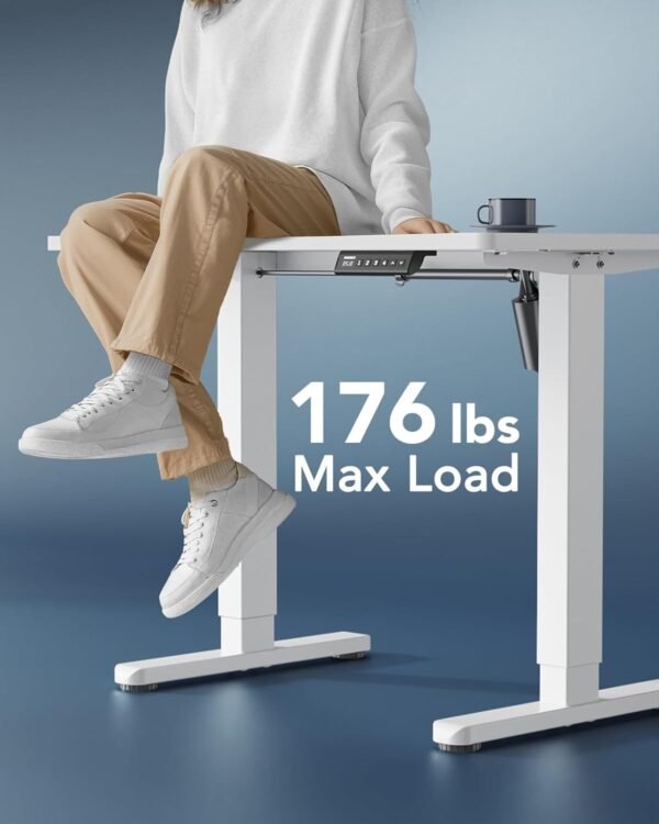 HUANUO Electric Small Standing Desk, 35" x 20" Whole Piece Desktop, Adjustable Height Computer Desk, 4 Height Memory Settings, Sit Stand Up Desk for Home Office, White