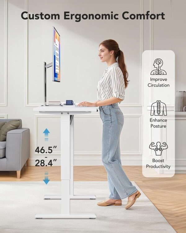 HUANUO Electric Small Standing Desk, 35" x 20" Whole Piece Desktop, Adjustable Height Computer Desk, 4 Height Memory Settings, Sit Stand Up Desk for Home Office, White